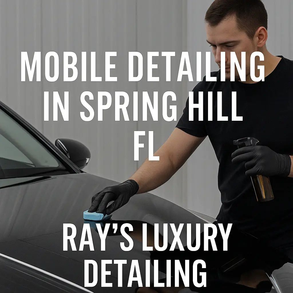 Mobile detailing in Spring Hill FL by Ray’s Luxury Detailing – professional applying coating to black car.